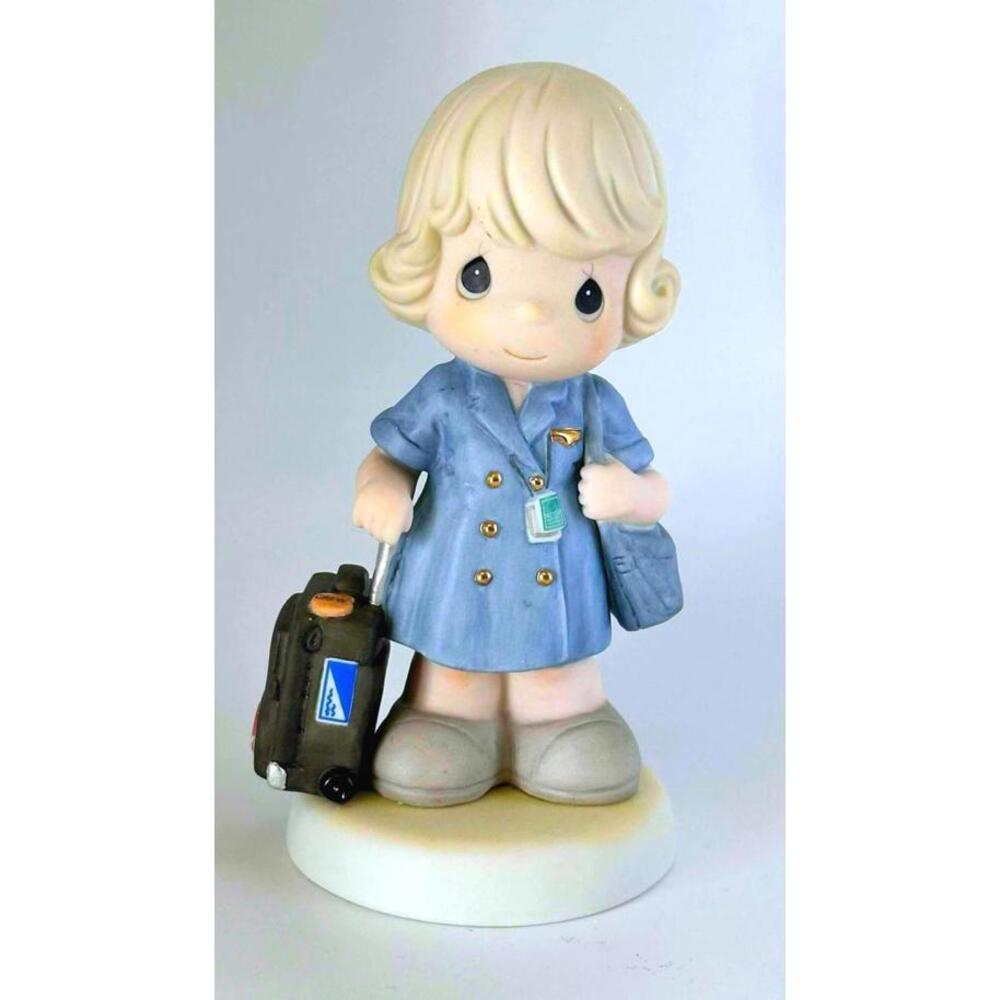 Precious Moments Flight Attendant Figurine.